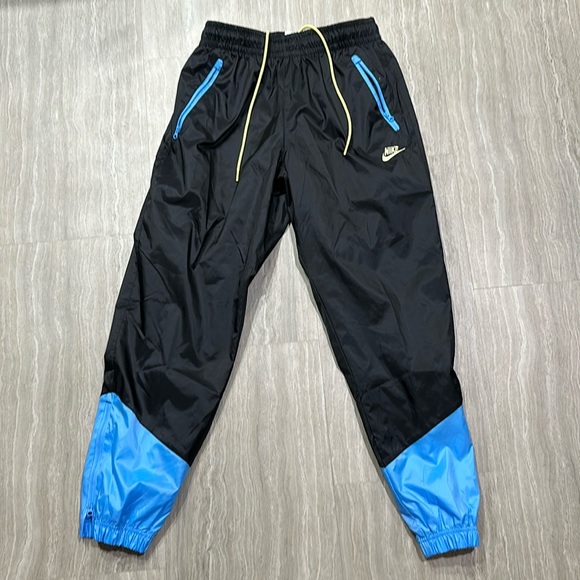 Nike Other - Nike Windrunner Pants size Medium
